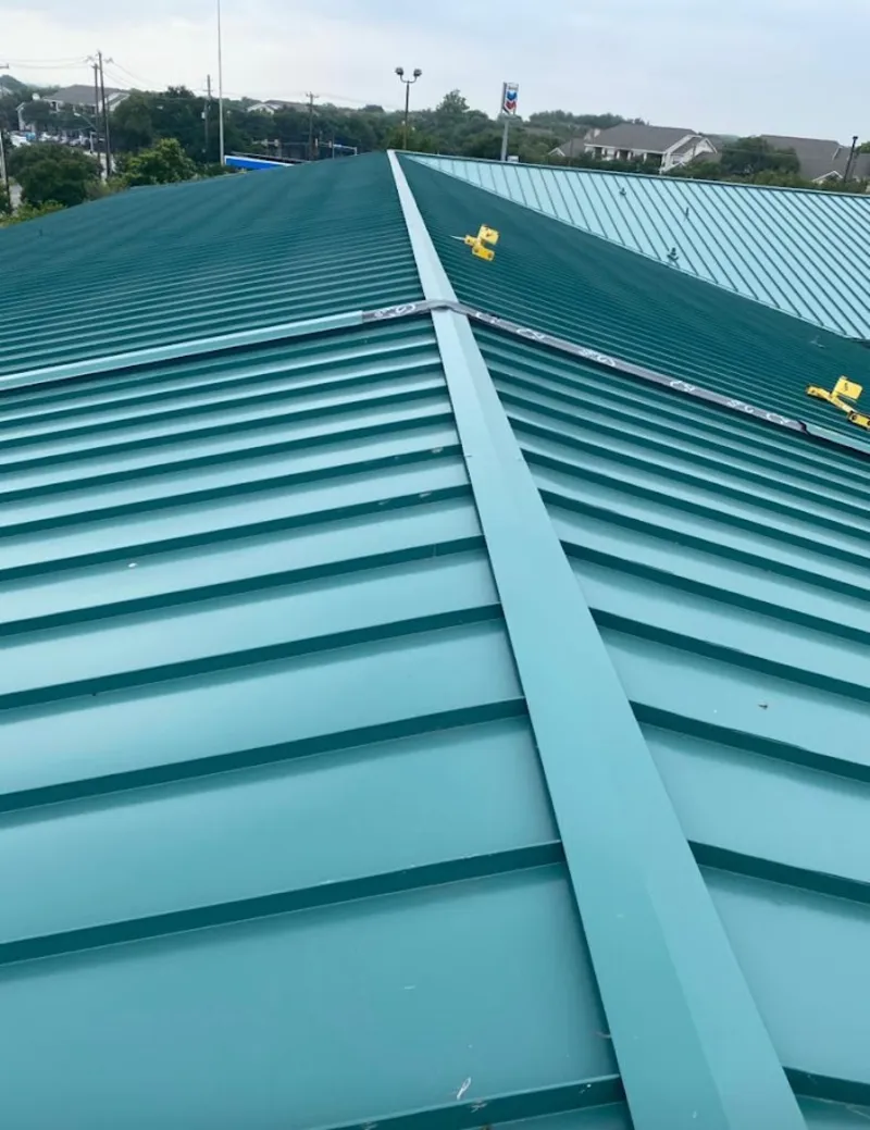 Green commercial metal roof ridge and valley for Metal Roof Repair in Haverford